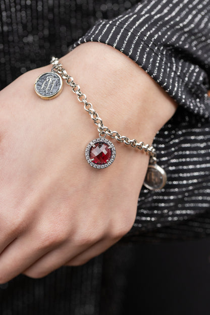 Bracciale in argento 925 con cristallo rosso zirconi e due stateri di Kroton indossato